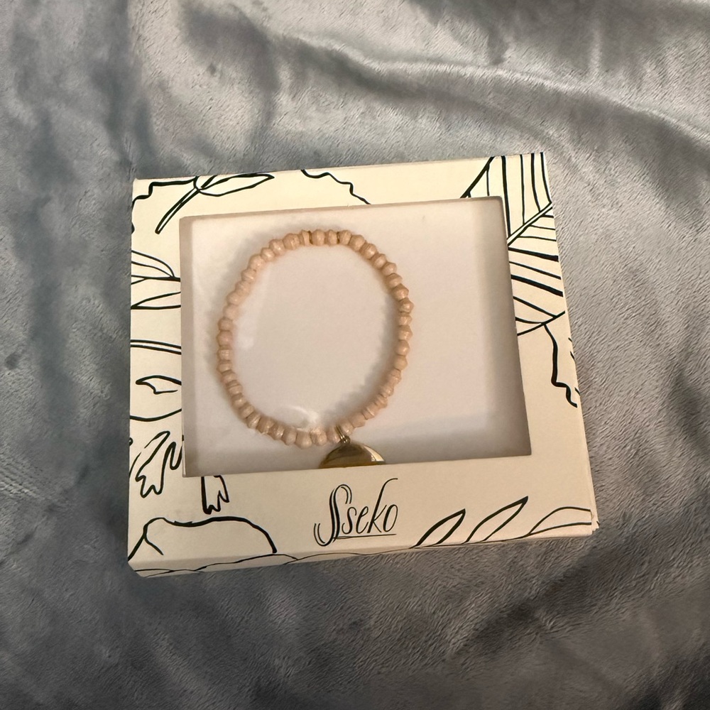 Sseko Tan Beaded Bracelet with Mango charm